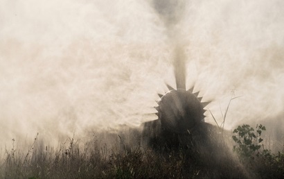 A cloud of chemicals being sprayed