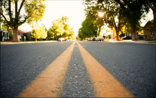 A close-up of road. TRACK VEHICULAR ACTIVITY WIRELESSLY